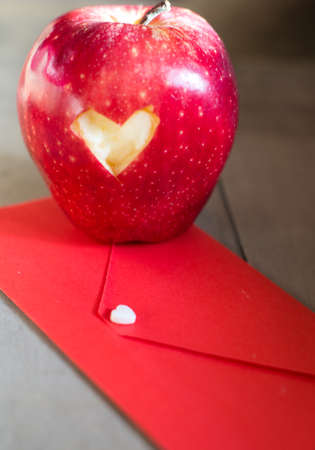 St. Valentine day - red envelope and heartの写真素材