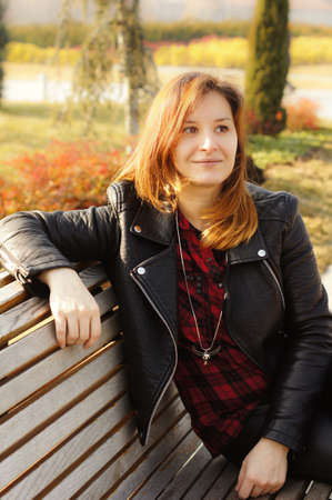 Portrait of beautiful woman outdoor, autumnal park