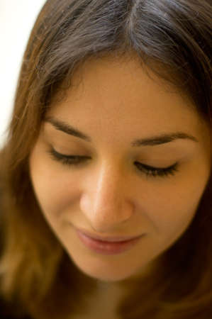 Portrait of beautiful brunet woman indoor