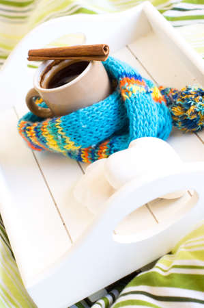 Cup of coffee in the wooden try on the bedの写真素材