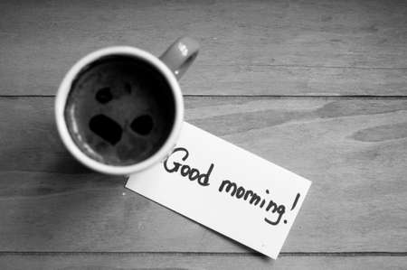 Cup of black coffee and Good morning noteの写真素材