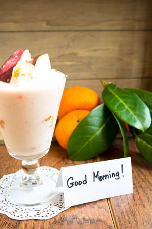 fresh fruits and yoghurt with Good morning noteの写真素材