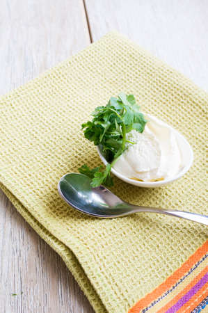 Closeup of sour crem on the tableの写真素材