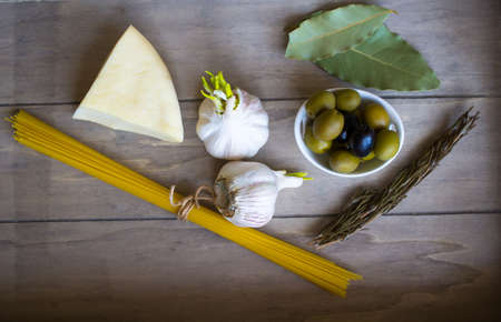 ingredients for cooking spaghetti with tomato sauce