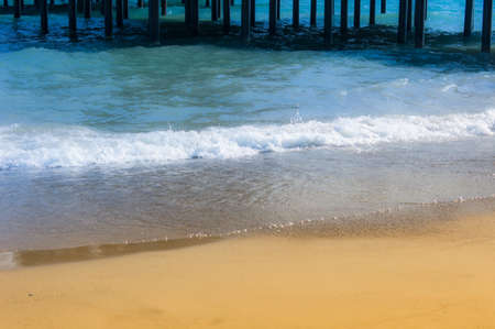 Soft wave of the sea on the sandy beachの写真素材