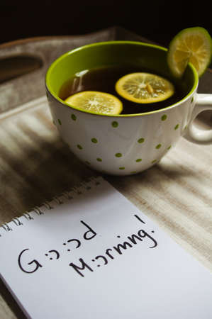 Mug with tea and lemon with Good morning noteの写真素材
