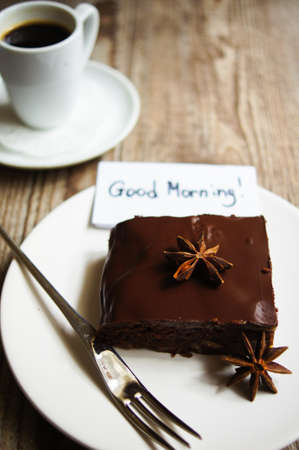 Piece of brownie cake and cup of coffeeの写真素材