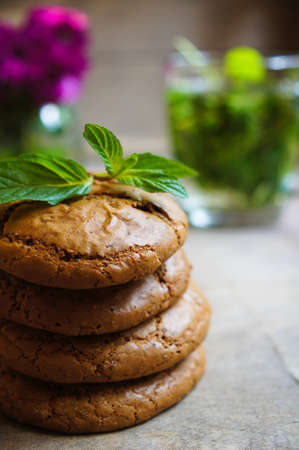 Mint tea and cookines with Good morning note on the wooden backgroundの写真素材