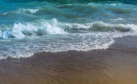Soft wave of the sea on the sandy beach