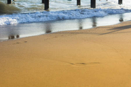 Soft wave of the sea on the sandy beachの写真素材