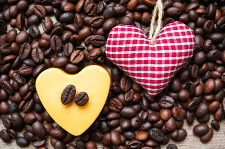 Heart shaped Mocca cake with cup of coffeeの写真素材