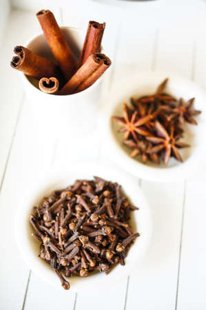 Christmas time spices, like a cinnamon sticks, anise stars and clovesの写真素材