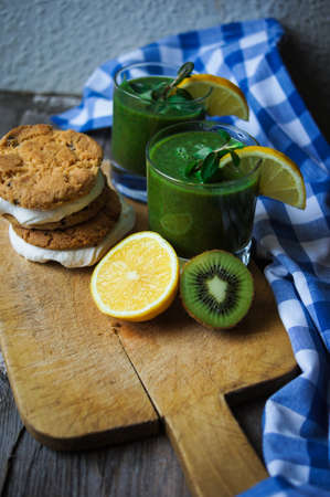 Healthy kiwi smoothie in a glass. Selective focusの写真素材