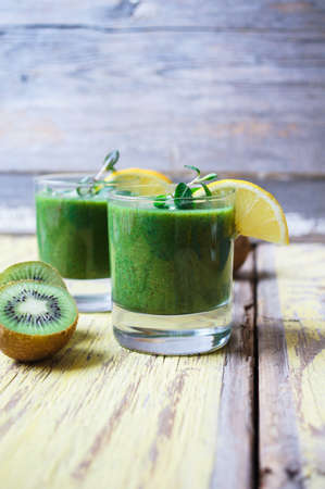 Healthy kiwi smoothie in a glass. Selective focusの写真素材