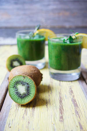 Healthy kiwi smoothie in a glass. Selective focusの写真素材