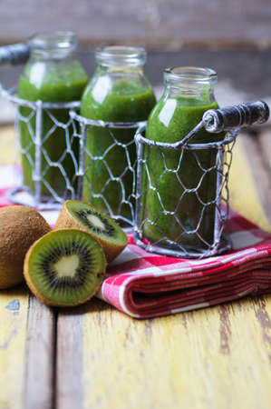 Healthy kiwi smoothie in a glass. Selective focusの写真素材