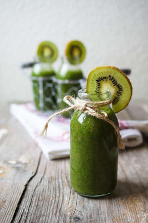 Healthy kiwi smoothie in a glass. Selective focusの写真素材