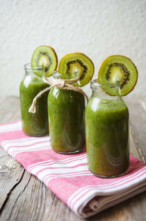 Healthy kiwi smoothie in a glass. Selective focusの写真素材