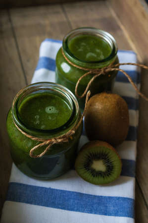 Healthy kiwi smoothie in a glass. Selective focusの写真素材