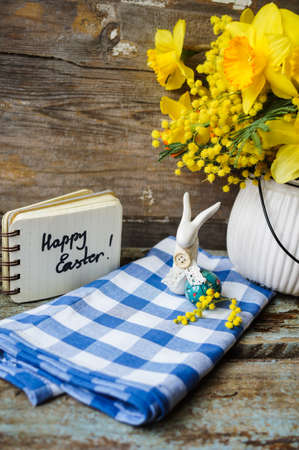 Easter time, spring flowers, easter eggs and  easter bunny