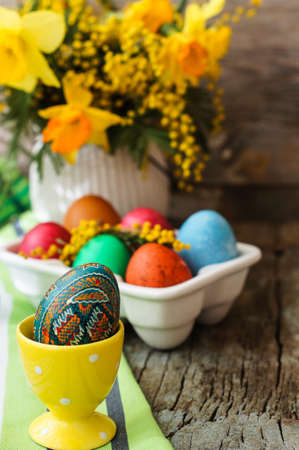 Easter time, spring flowers, easter eggs and  easter bunny