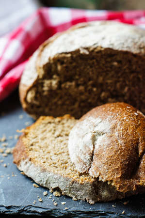 Close-up of traditional homemade bread on napkin