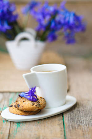 Cup of fresh herbal tea with mint on wooden tableの写真素材