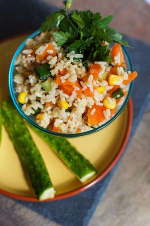 Healthy breakfast with rice and vegetables and orange juice