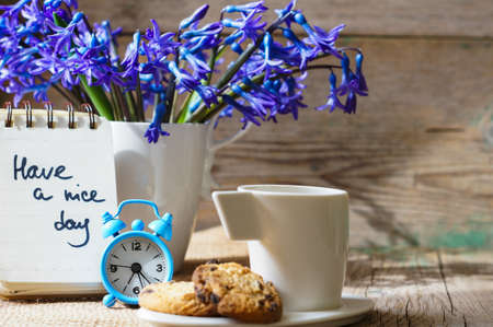 Cup of fresh herbal tea with mint on wooden tableの写真素材