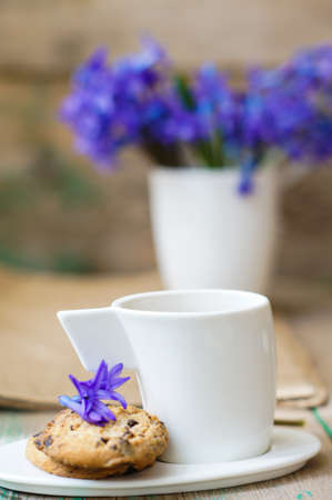 Cup of fresh herbal tea with mint on wooden tableの写真素材