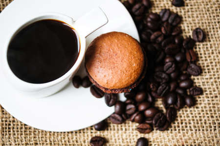 Colorful macaroons on old wooden backgroundの写真素材