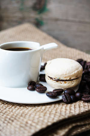 Colorful macaroons on old wooden backgroundの写真素材