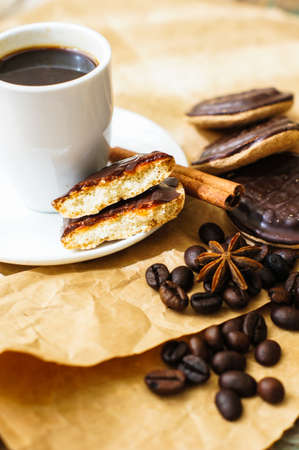 Cup of black coffee on the wooden table