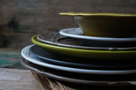 Vitage plates on the wooden tableの写真素材