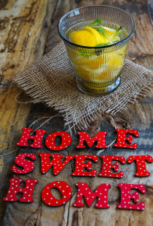 Homemade lemon and mint lemonade on the old tableの写真素材