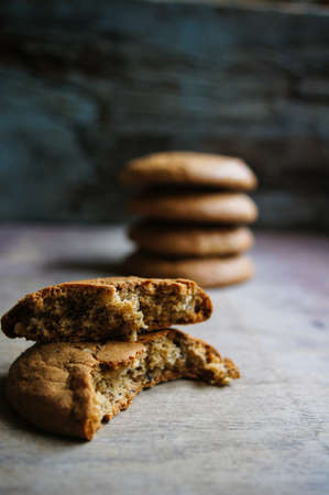 Oat flake cookies on the old wooden table
