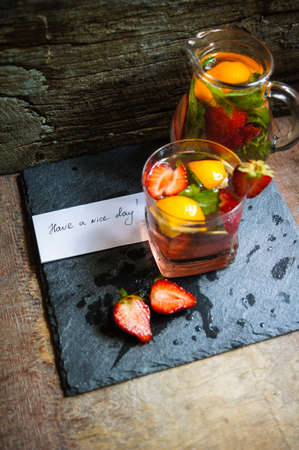 Lemonade with fresh strawberries, lemon and mintの写真素材