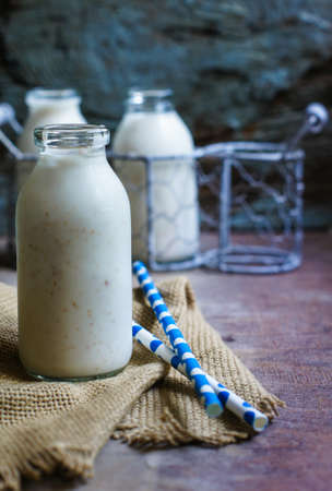 glass of homemade yogurt in a rustic styleの写真素材