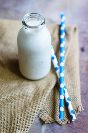 glass of homemade yogurt in a rustic styleの写真素材