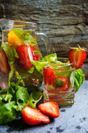 Lemonade with fresh strawberries, lemon and mintの写真素材