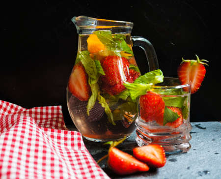 Lemonade with fresh strawberries, lemon and mintの写真素材