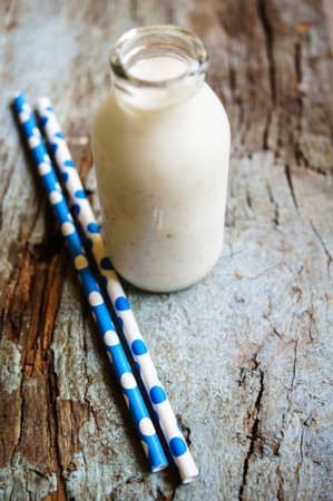 glass of homemade yogurt in a rustic styleの写真素材