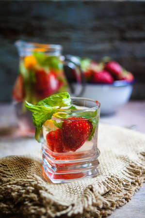 Lemonade with fresh strawberries, lemon and mintの写真素材