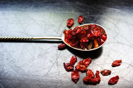 dried goji berries on the rustic style old tableの写真素材