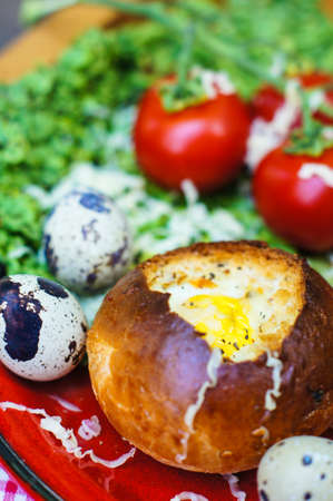 Healthy Egg in a Basket with fresh vegetable salad for dinnerの写真素材