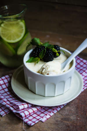 Cheesecake with blackberries and mint, selected focusの写真素材