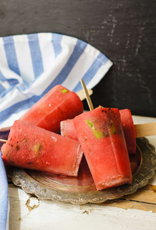 Homemade popsicles with watermelon and lime