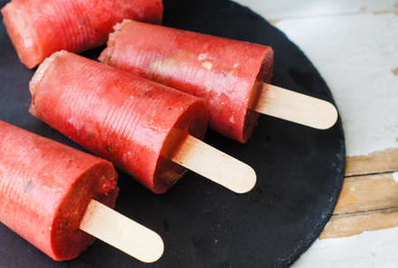 Homemade popsicles with watermelon and limeの写真素材