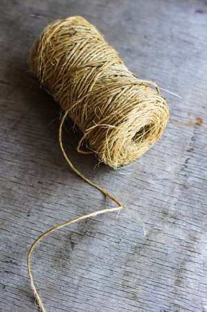 Christmas wrapping accessories on old wooden background. Selective focusの写真素材
