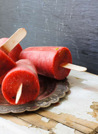 Homemade popsicles with watermelon and lime